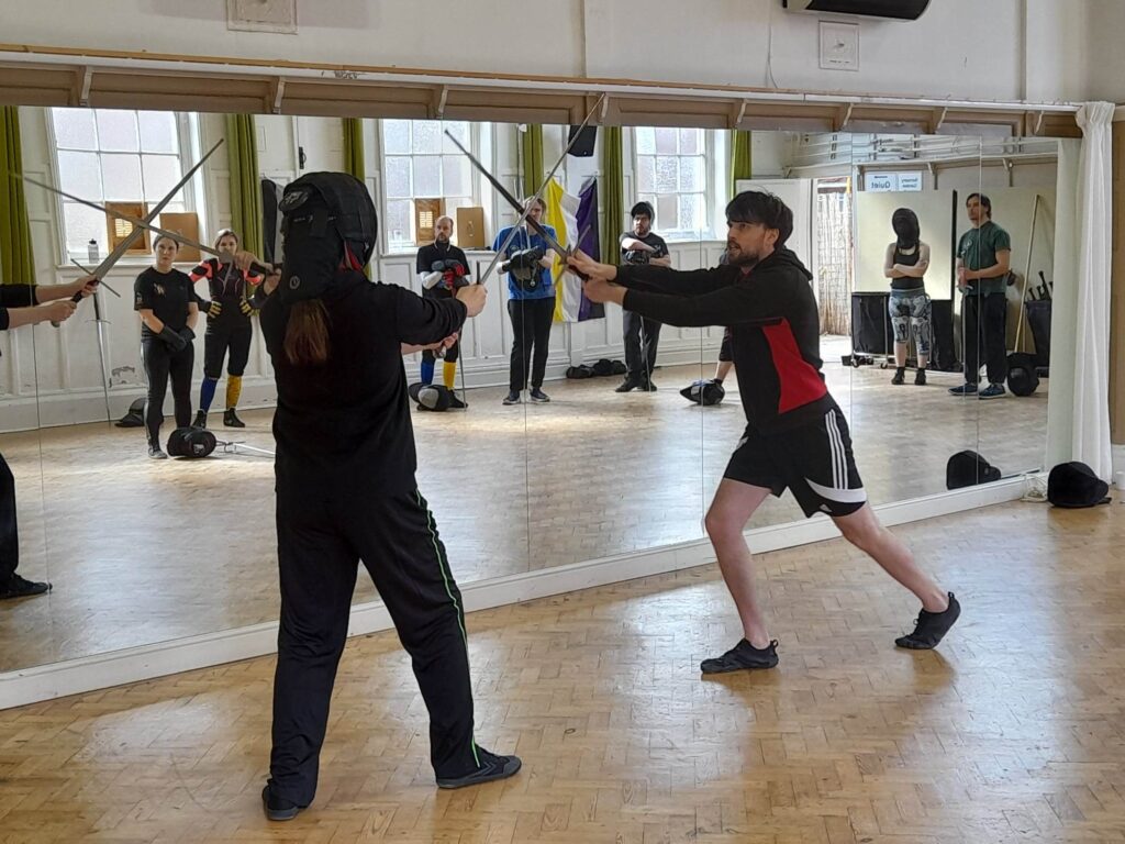 MCG instructors, Matthew and Ross, demonstrating a longsword technique.